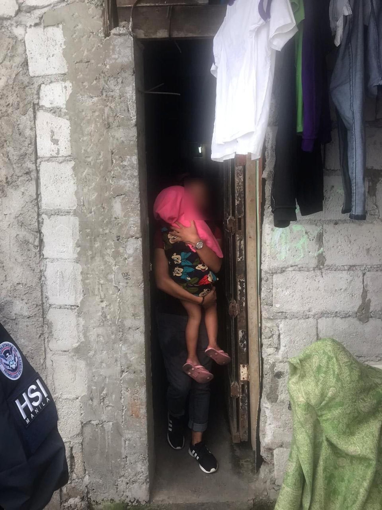 Female child OS Ec survivor being rescued by social worker IJM
