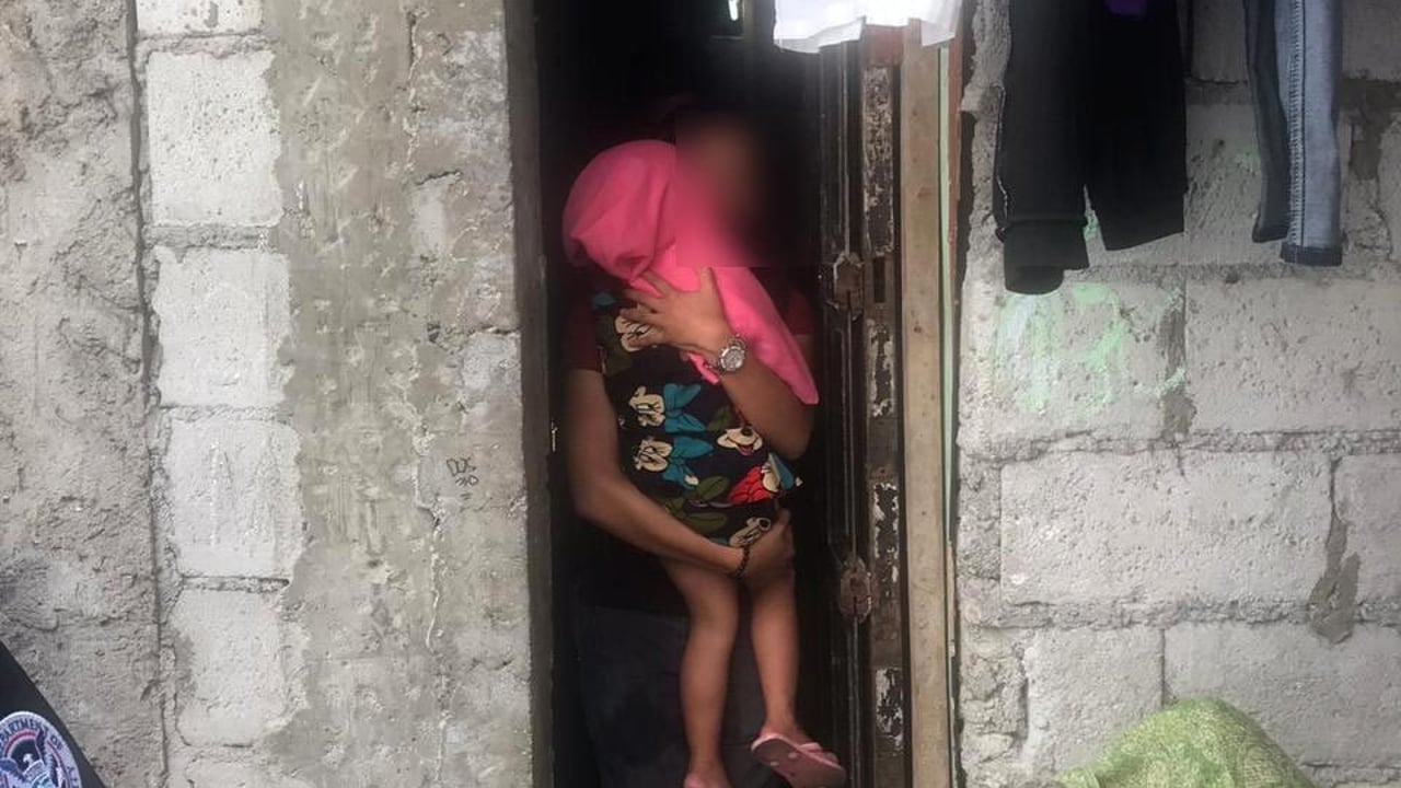 Female child OS Ec survivor being rescued by social worker IJM