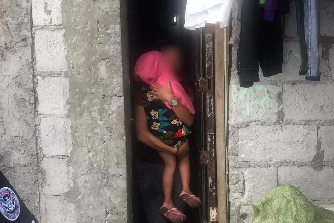 Female child OS Ec survivor being rescued by social worker IJM